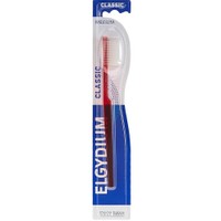 Elgydium Classic Medium Toothbrush 1 Τεμάχιο - Κόκκινο - Χειροκίνητη Οδοντόβουρτσα Ενηλίκων Μέτριας Σκληρότητας με Εργονομική Λαβή & Αποστρογγυλεμένες Ίνες