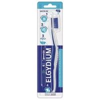 Elgydium 4in1 Toothbrush 1 Τεμάχιο - Medium - Οδοντόβουρτσα 4 σε 1 με Καθαριστική Γλώσσας, Κωνικό Μεσοδόντιο Βουρτσάκι & Λευκαντική Γόμα